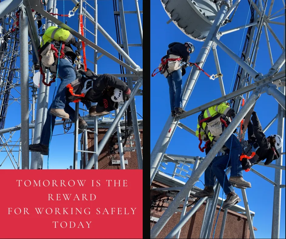 Premier climbers in harnesses on a tower: Tomorrow is the reward for working safely today